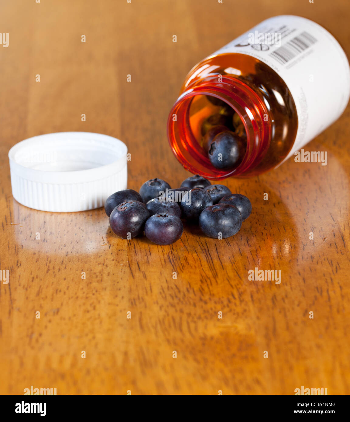 Blueberries in drug bottle Stock Photo Alamy