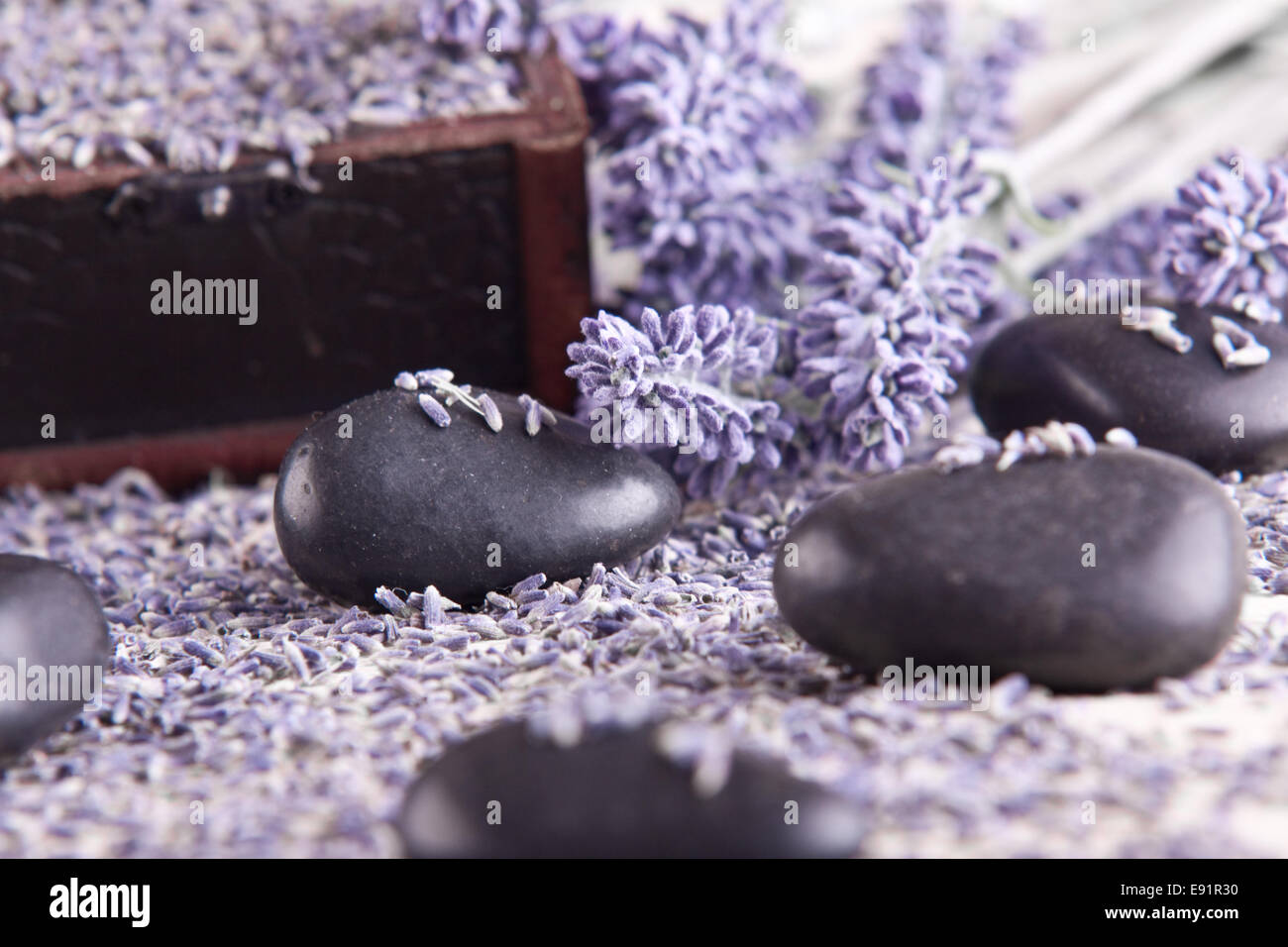 Massage stones with lavender flowers Stock Photo Alamy