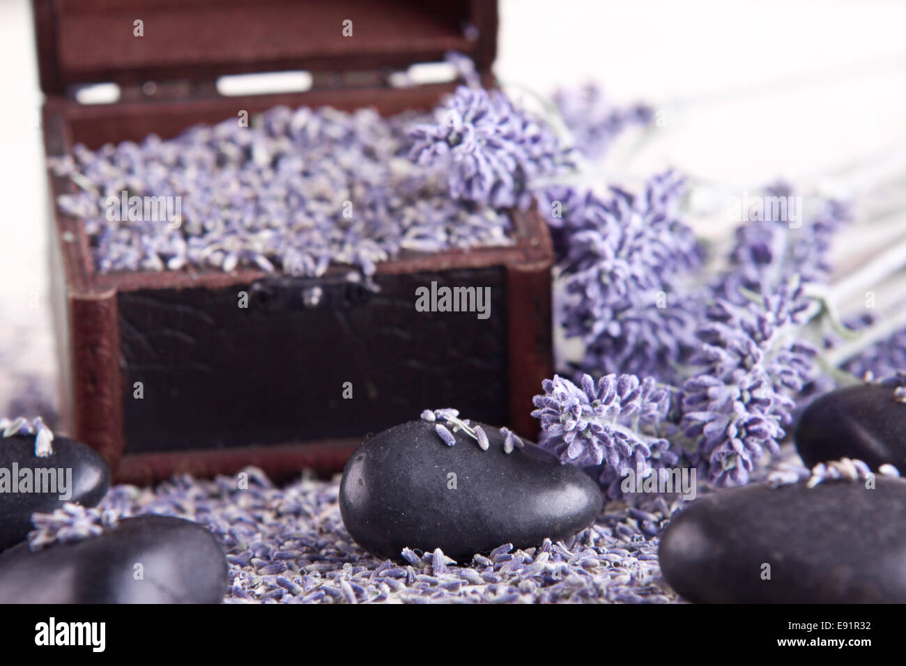 Massage stones with lavender flowers Stock Photo Alamy