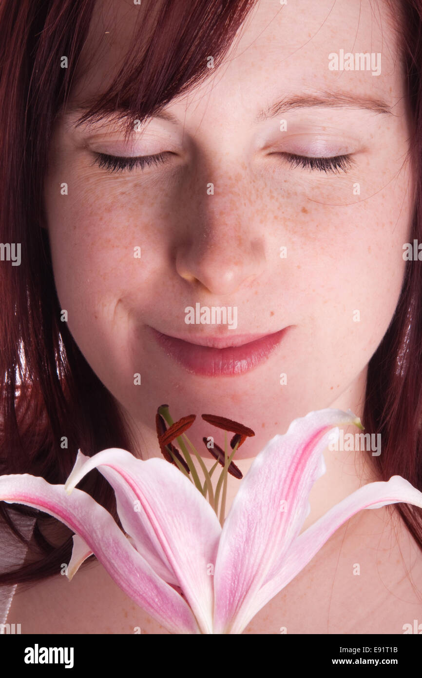 Beautiful woman with lily Stock Photo