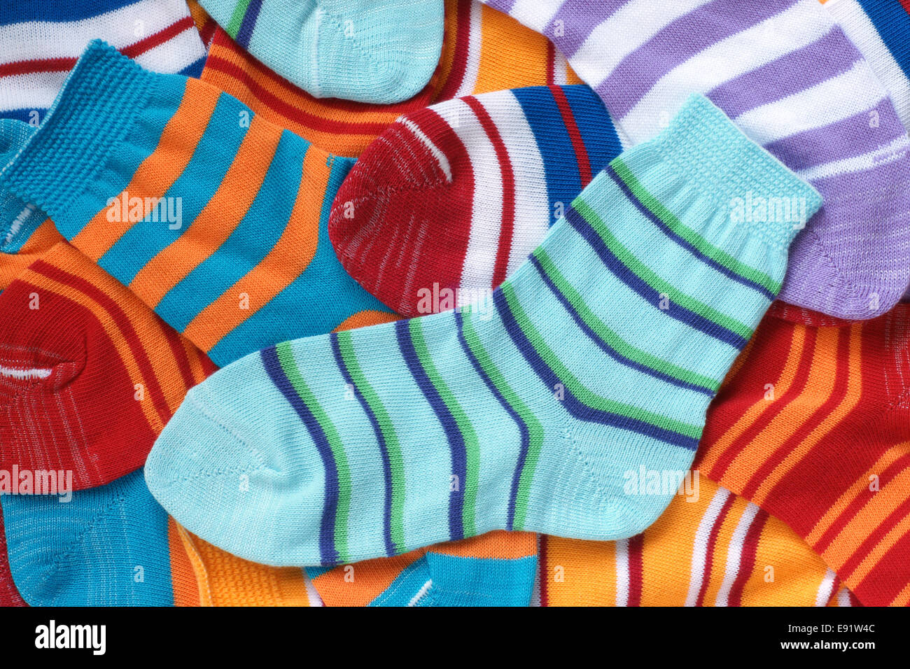 Many pairs of child's striped socks Stock Photo Alamy