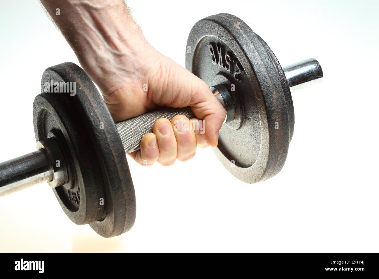 dumbbell and hand Stock Photo