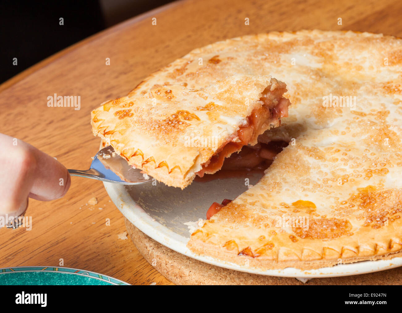Home made apple and strawberry pie served Stock Photo