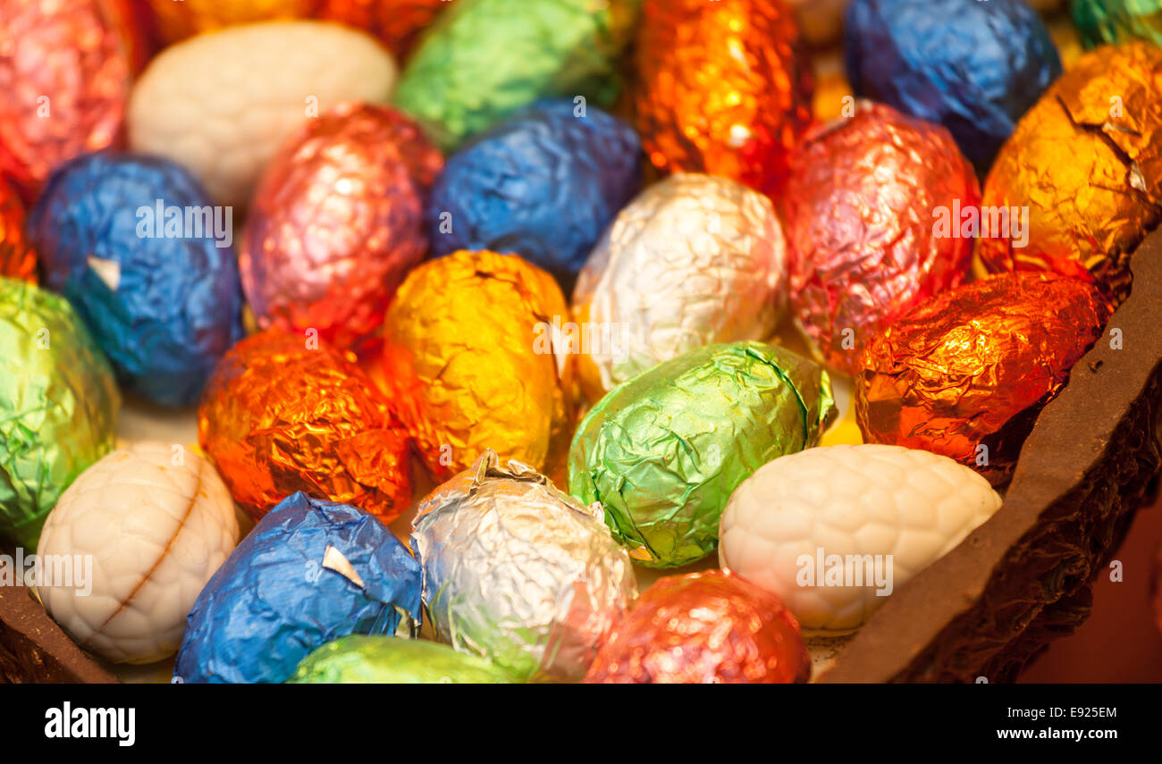 Foil wrapped easter eggs in chocolate egg Stock Photo Alamy