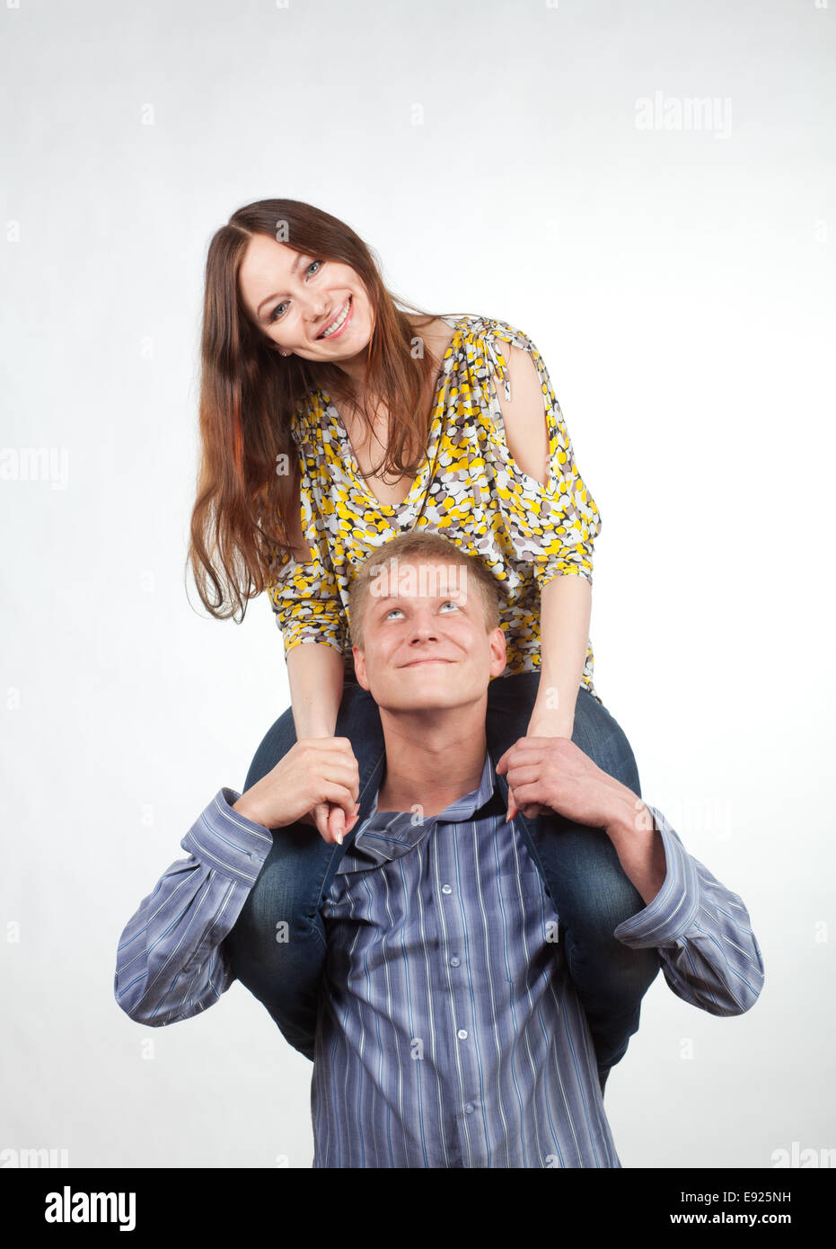 Girl sitting mans shoulder hires stock photography and images Alamy