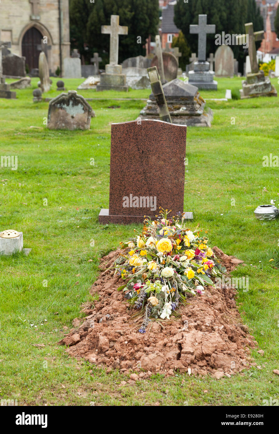 Freshly dug grave in cemetery Stock Photo Alamy