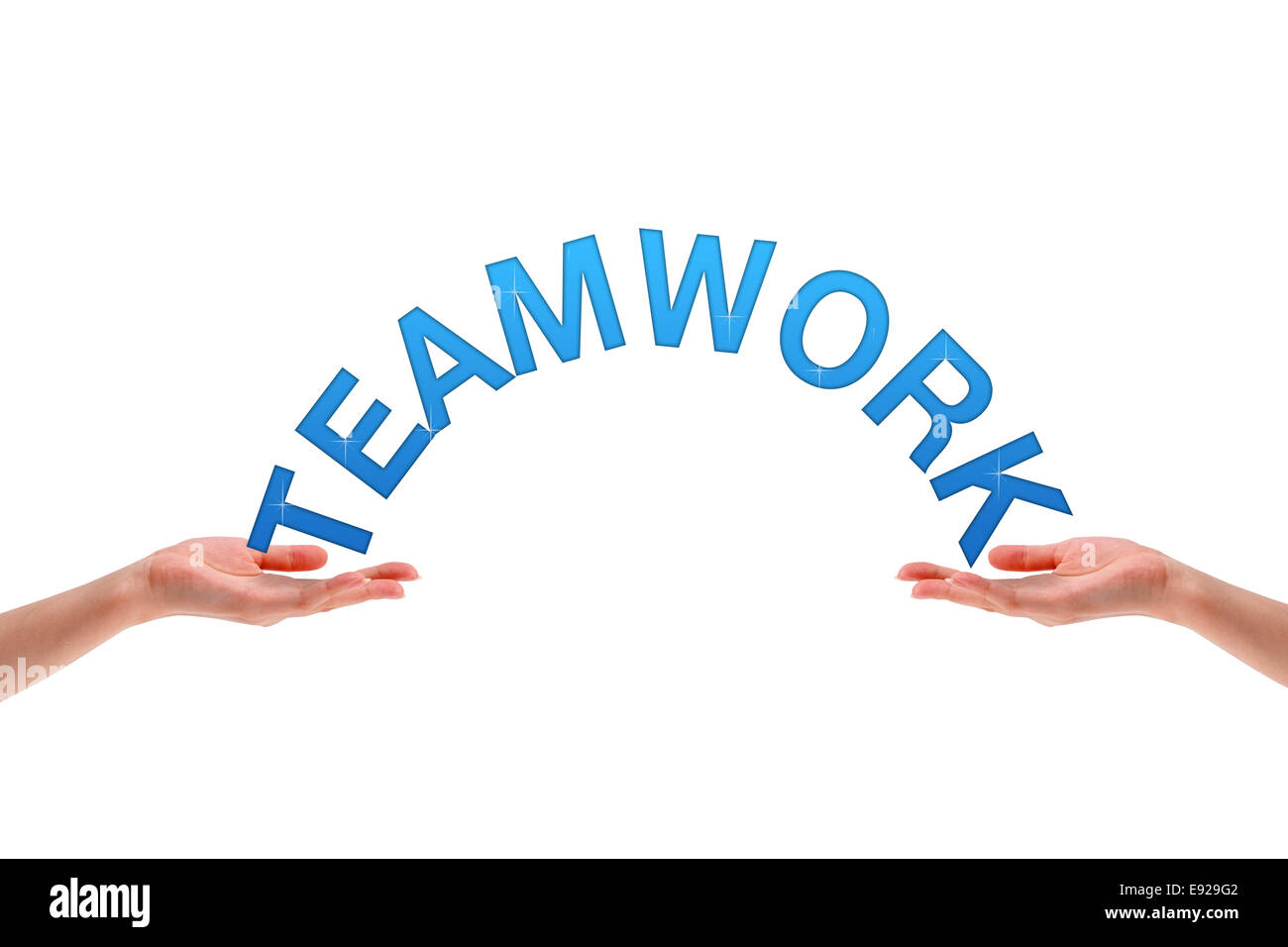 Hands holding the word teamwork Stock Photo
