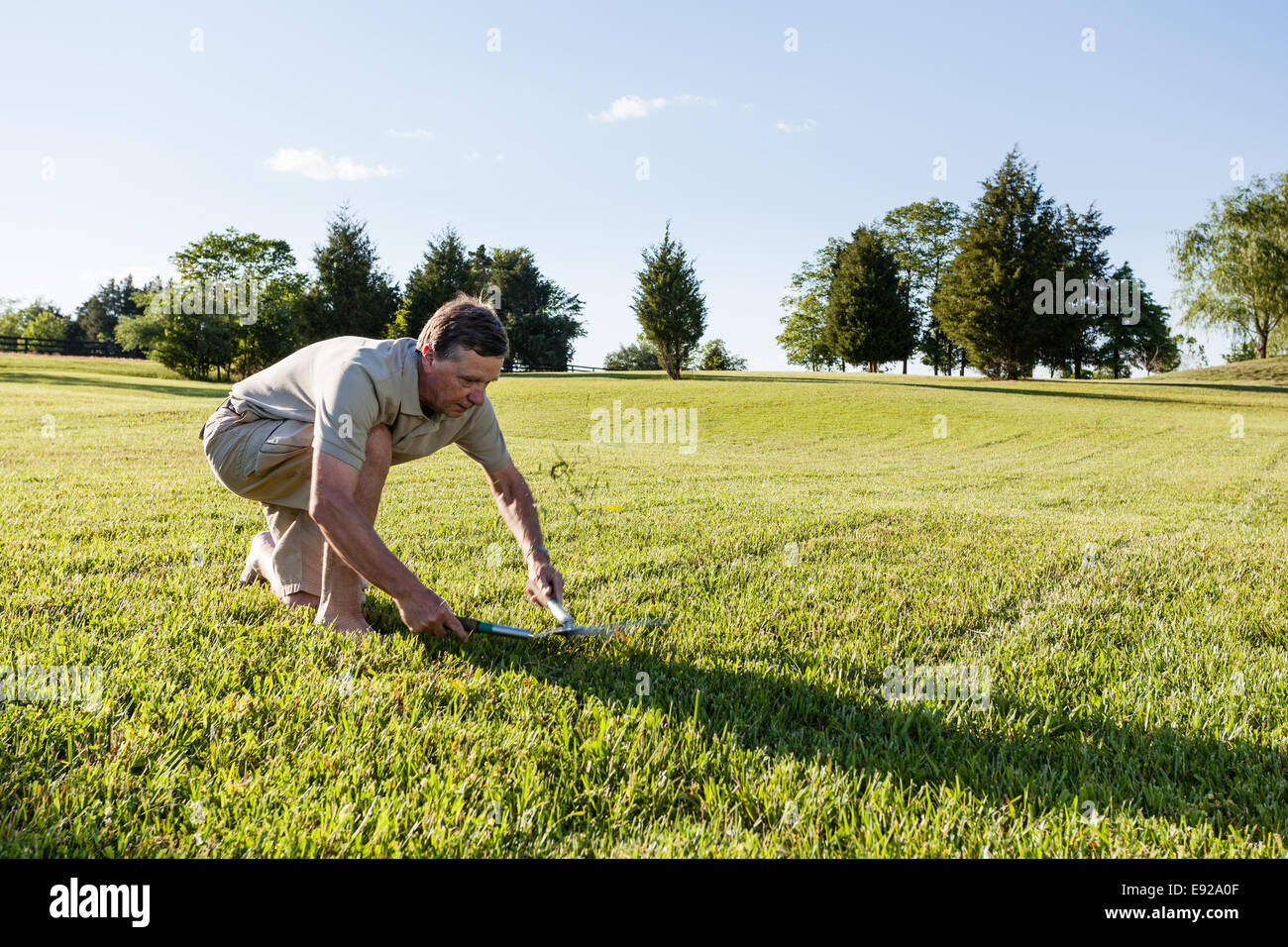 Men cutting turf hi-res stock photography and images - Alamy