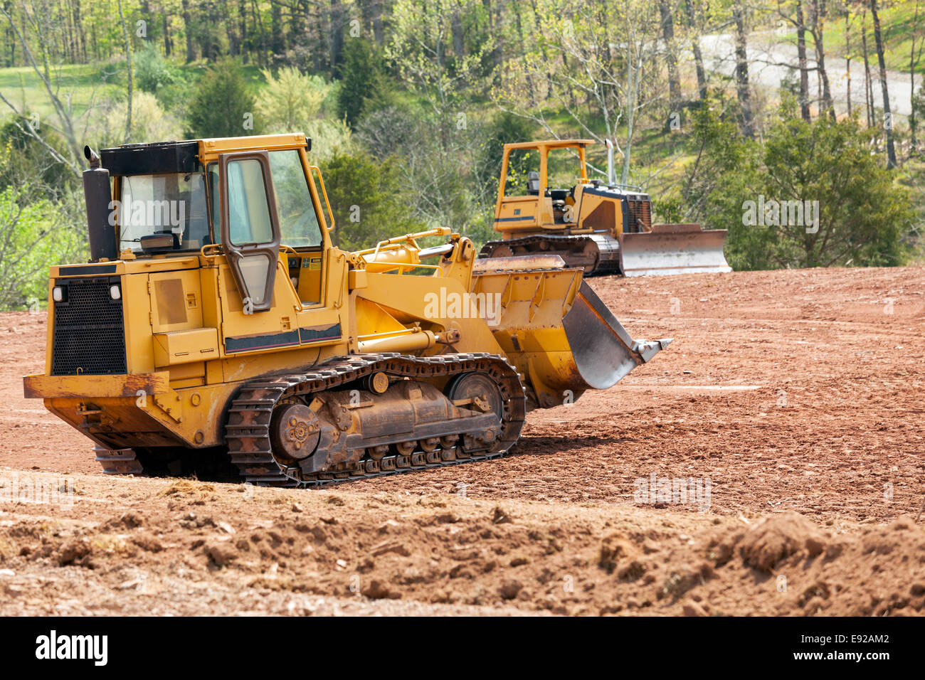 Large earth mover digger clearing land Stock Photo Alamy