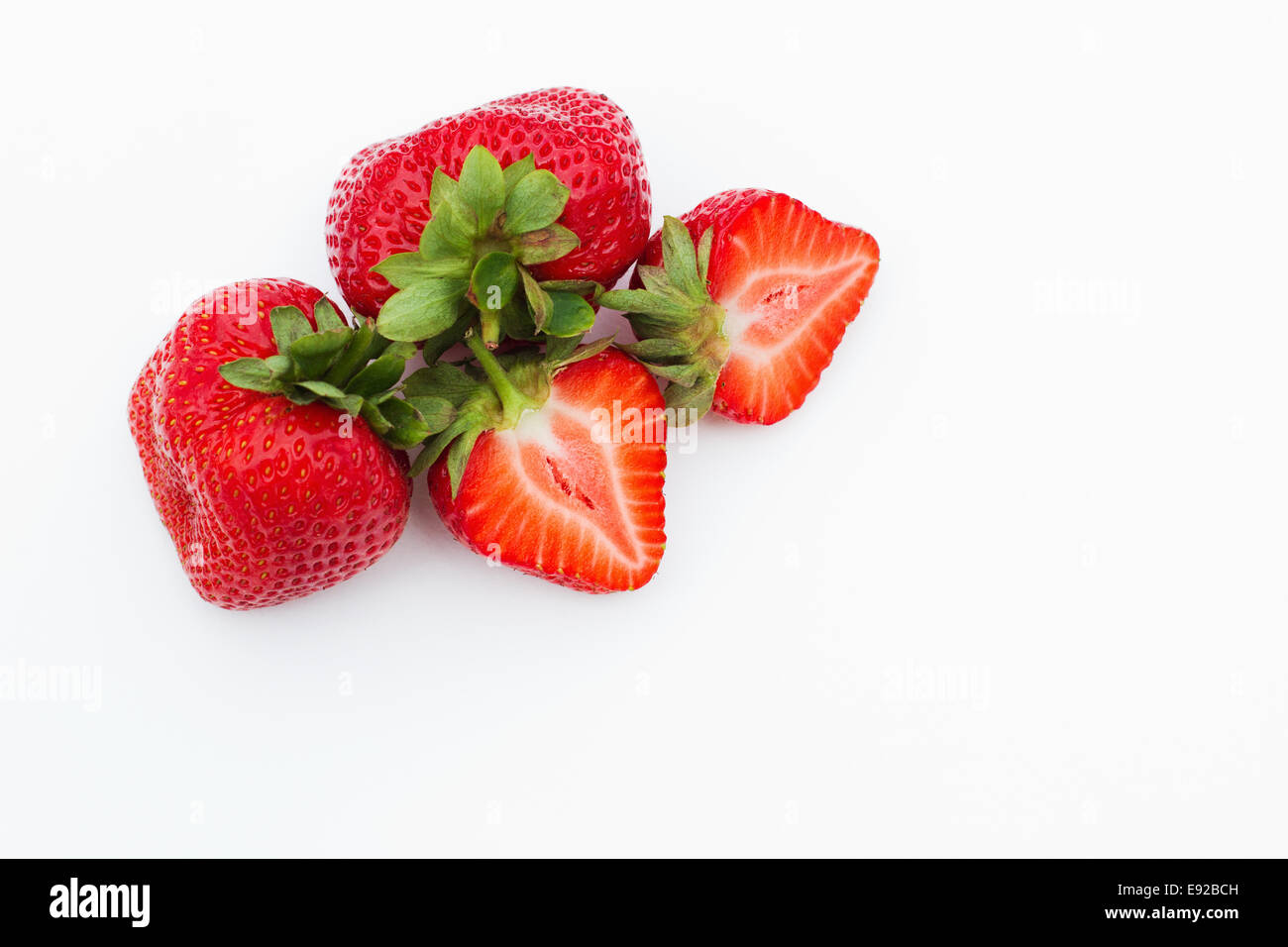 Three strawberries hi-res stock photography and images - Alamy
