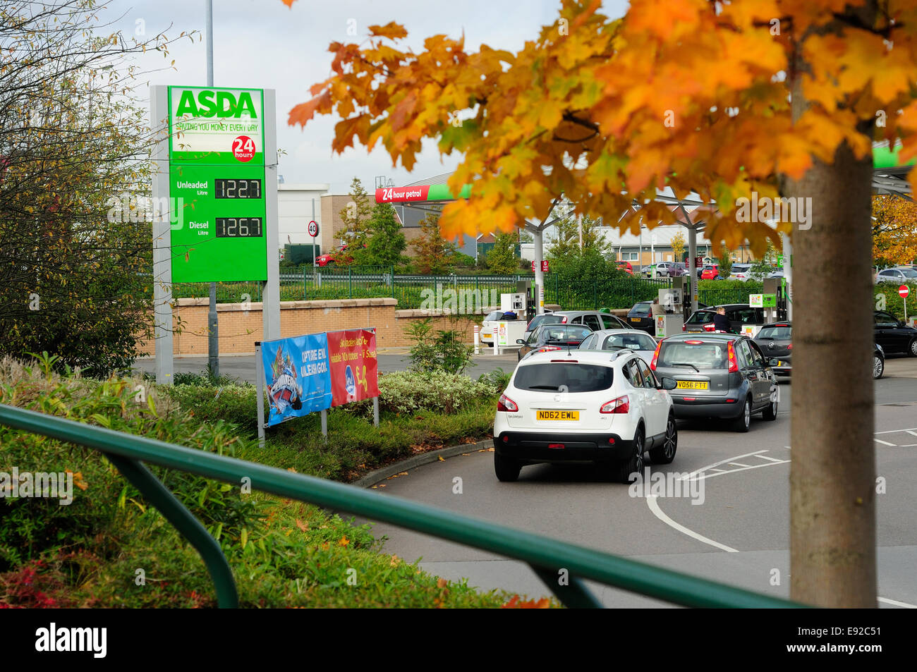 Mansfield, Nottinghamshire, UK. 17th October, 2014.  Supermarkets across Britain are tempting shoppers in with low fuel prices to win back costumers to their stores. The moves follow a decline in the price of brent crude oil . Asda are the cheapest in Mansfield , at 122.7 for unleaded and 126.7 for  diesel . Credit:  IFIMAGE/Alamy Live News Stock Photo