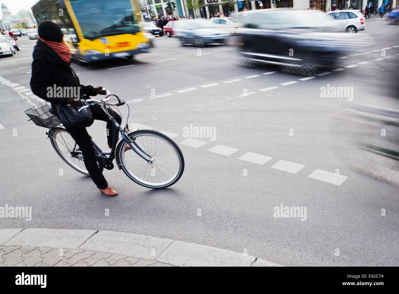 cyclist waiting at the crossroad Stock Photo