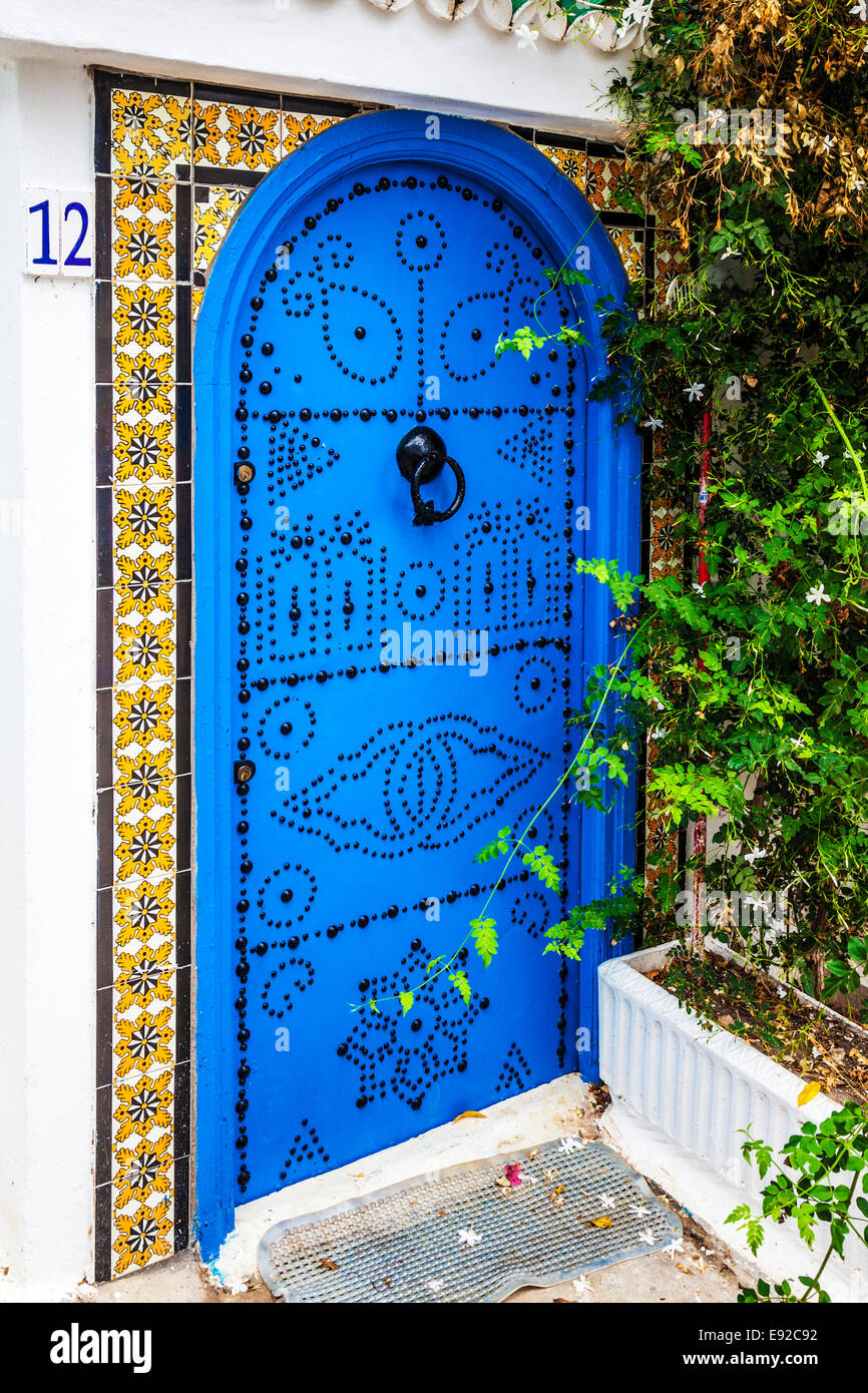 A typical blue, studded wooden door in Sidi Bou Said, Tunisia Stock Photo -  Alamy