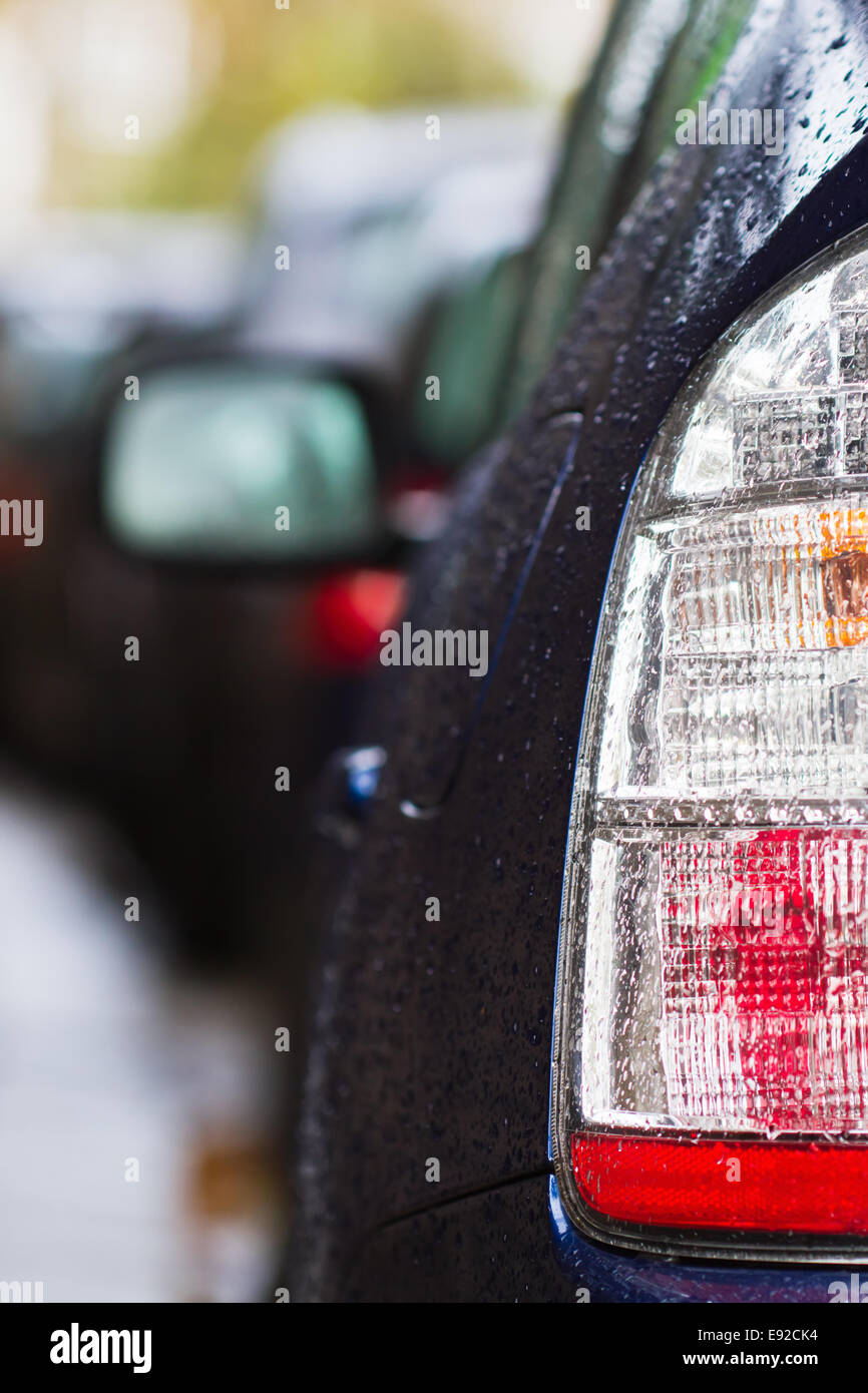 taillight of a car with raindrops Stock Photo