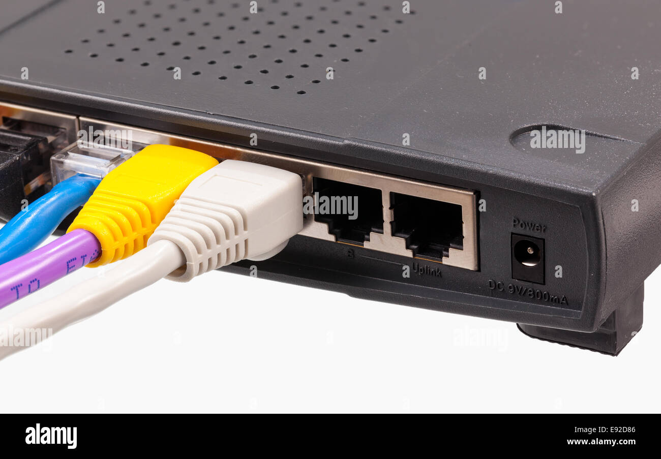 Cat 5 cables in multiple colors in router Stock Photo Alamy