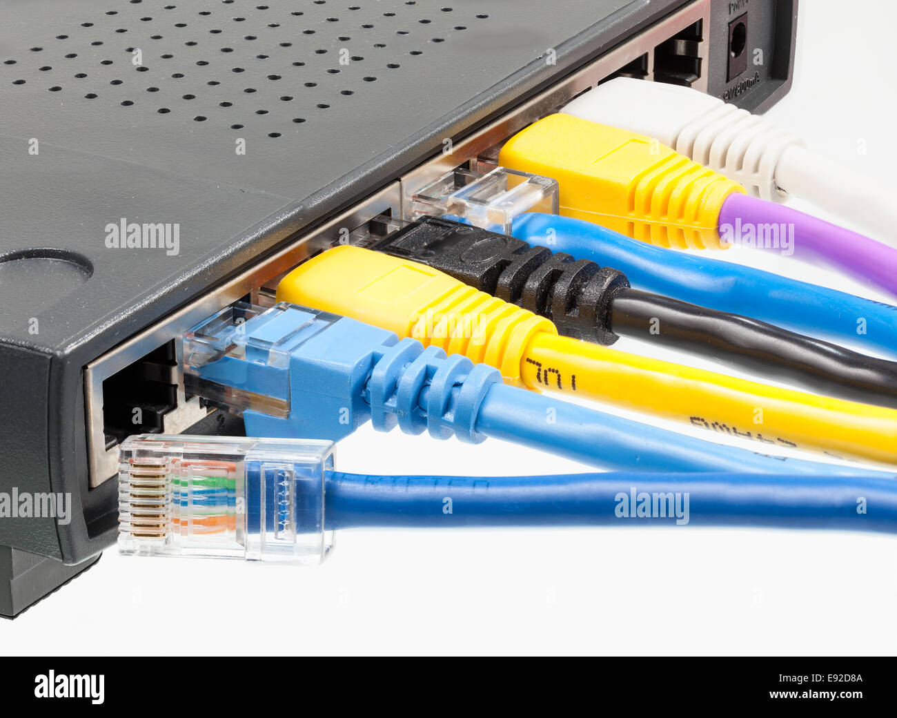 Cat 5 cables in multiple colors in router Stock Photo Alamy