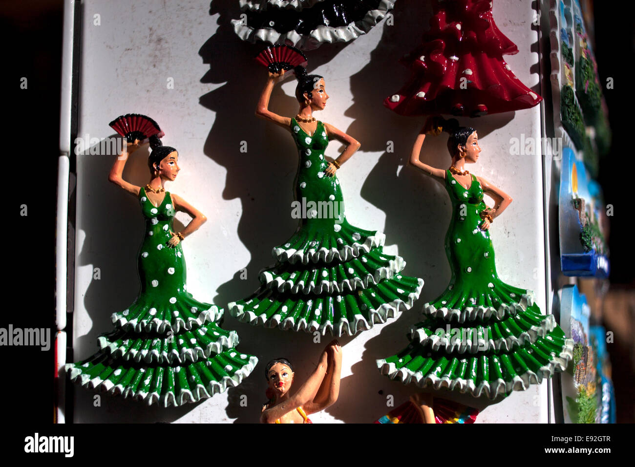 Ceramic dolls of female Flamenco dancers decorate a folk art shop in Granada, Andalusia, Spain Stock Photo