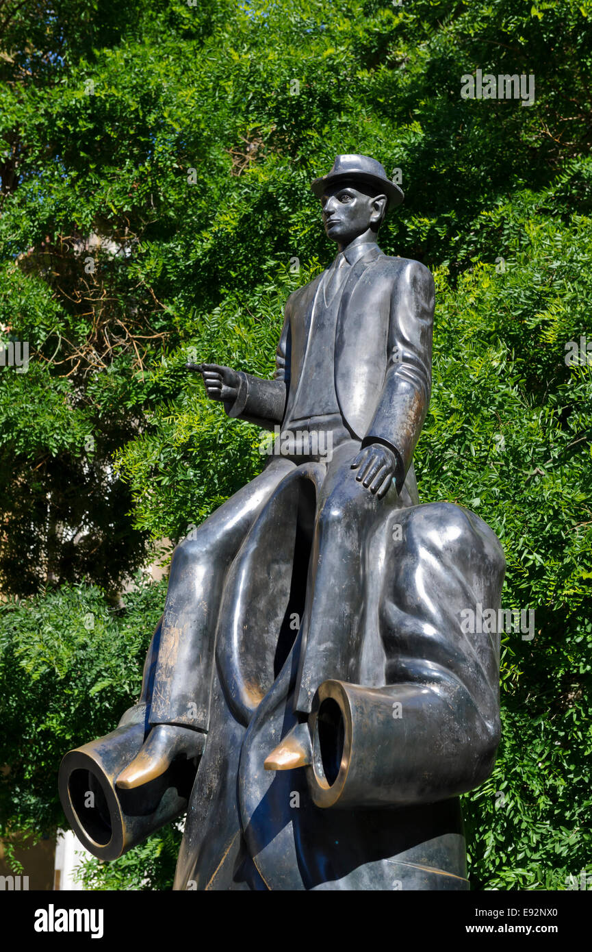 A bronze sculpture of Franz Kafka in the Jewish quarter in the City of