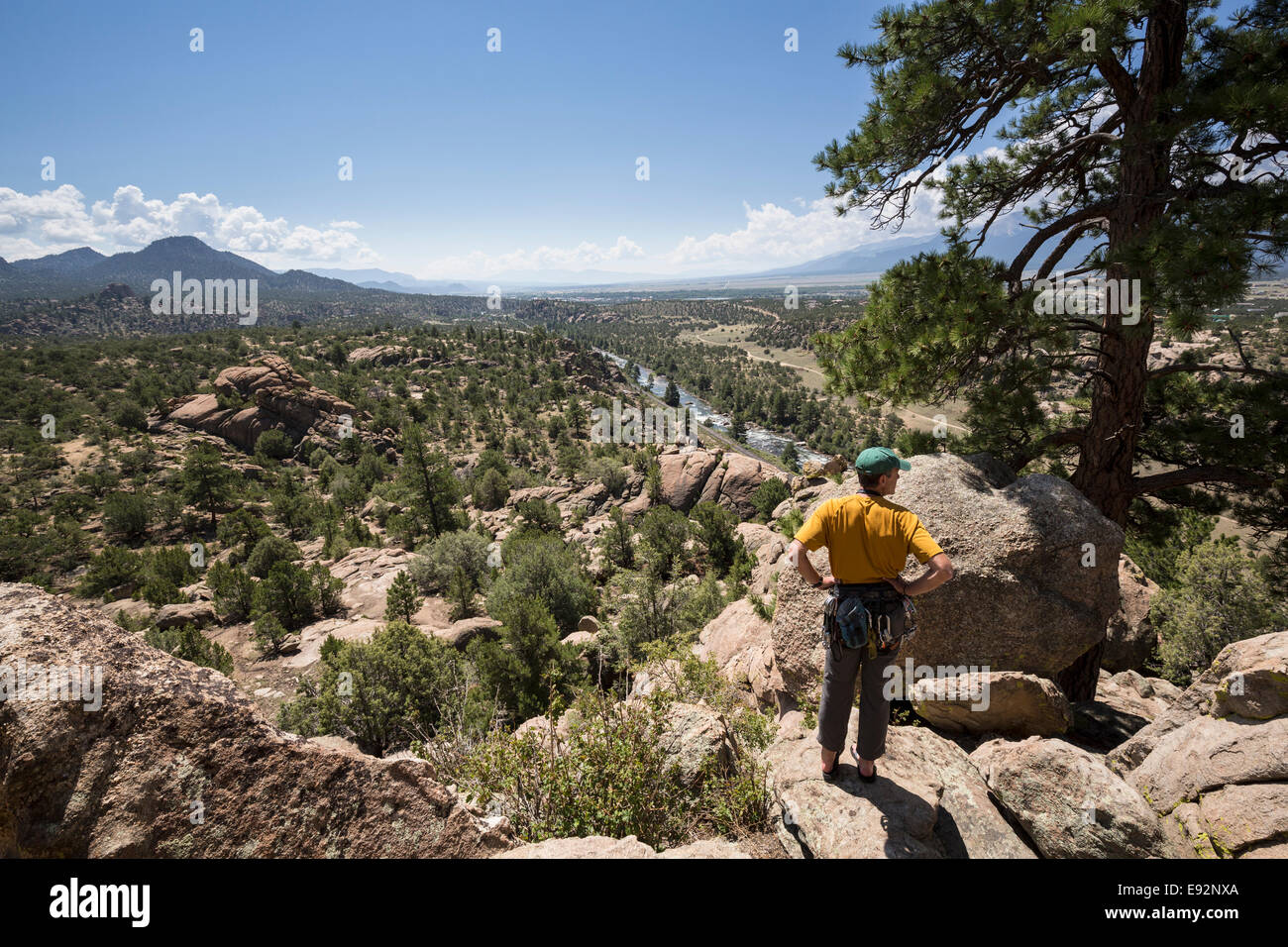 Senior male climber overlooking the valley at Turtle Rocks near Buena Vista, Colorado, USA Stock Photo