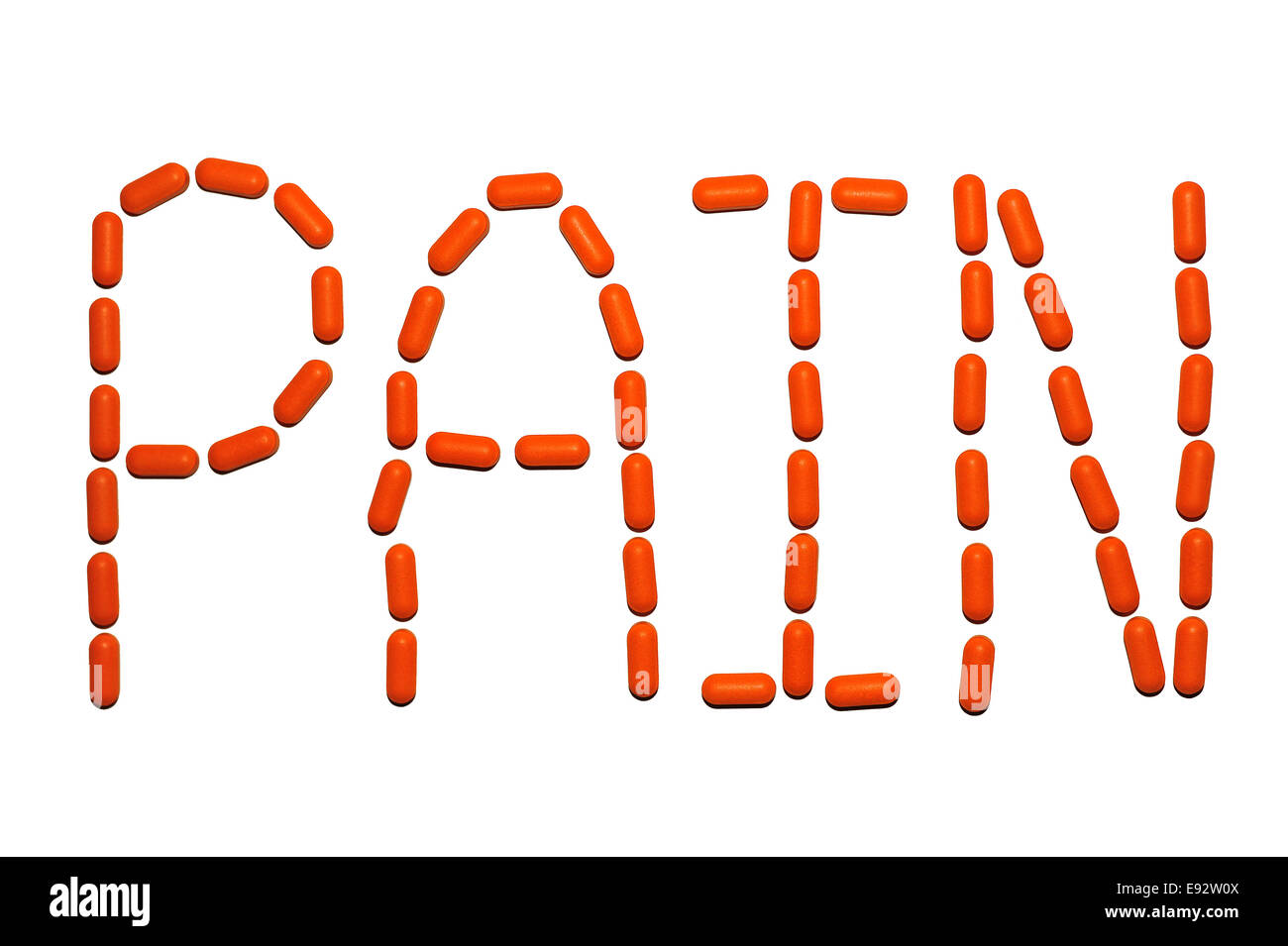 An image of the word pain made from orange medical pills. Stock Photo
