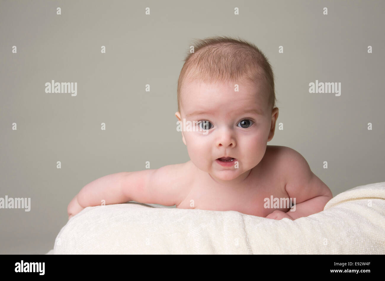 9 month old baby boy holding his head up Stock Photo
