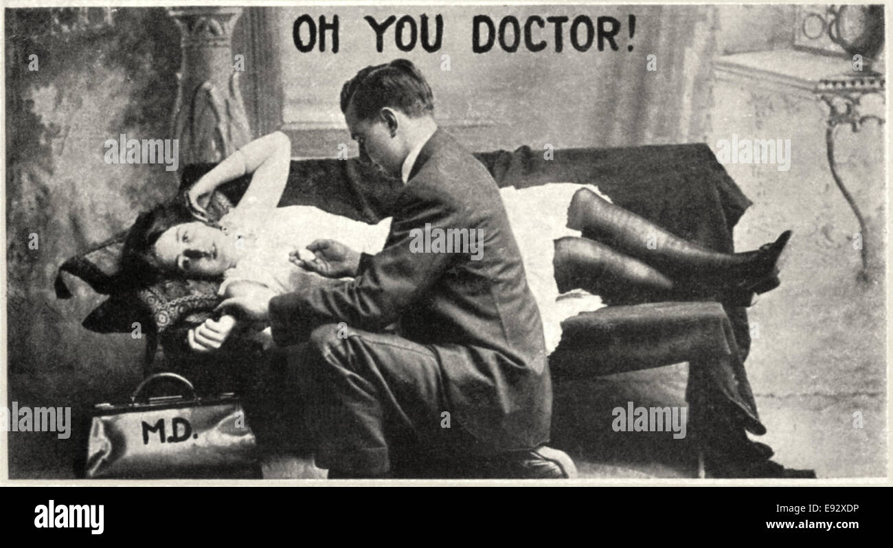 Doctor Checking Woman's Pulse Rate While She is Lying Down, 'Oh You Doctor!', Postcard, circa 1920 Stock Photo
