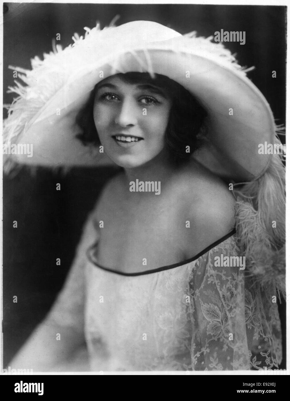 Woman in Large Hat with White feathers, Close-Up Portrait, circa 1922 Stock Photo