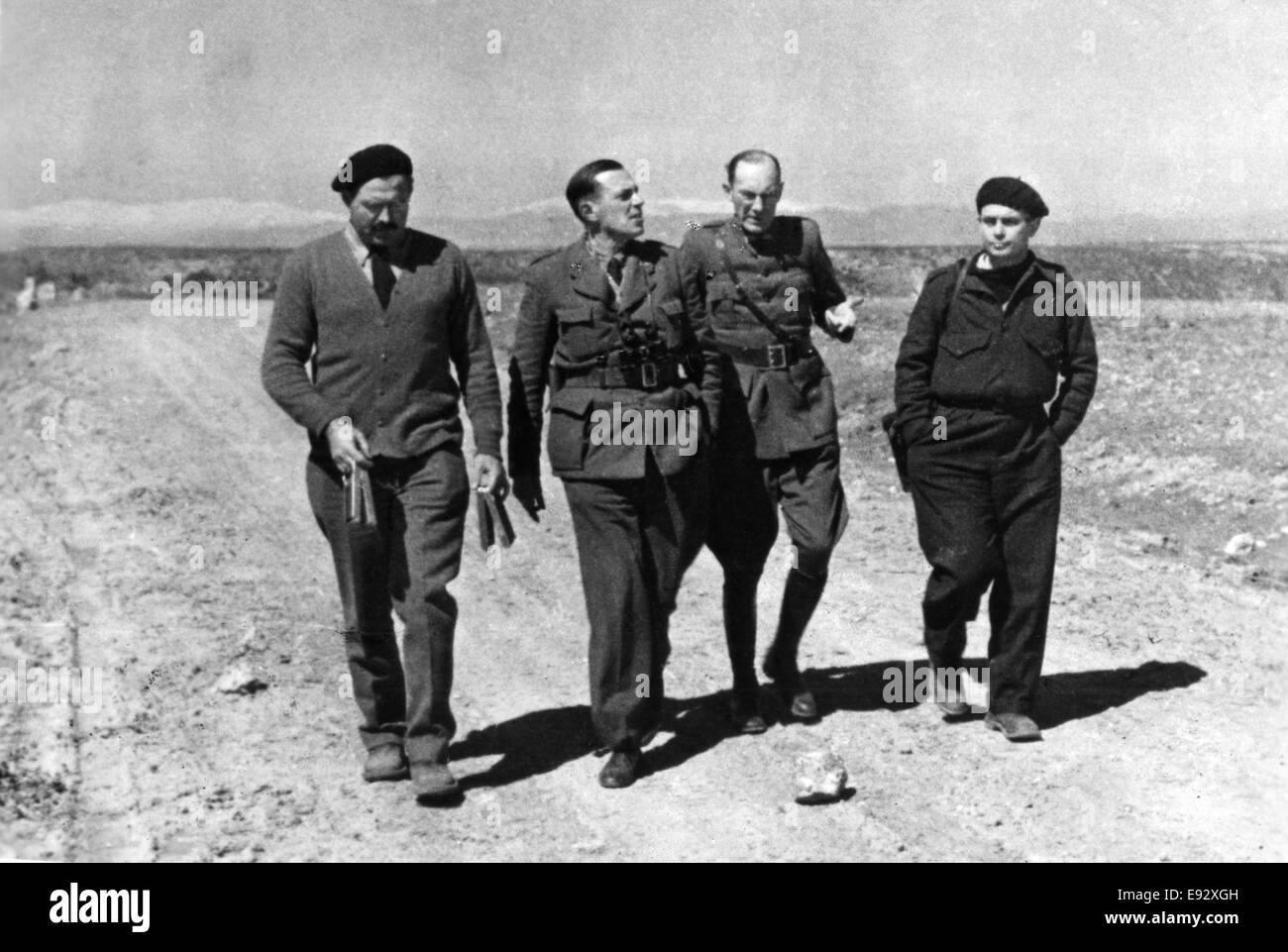 Ernest Hemingway-L, and Joris Ivens-R, on-set of the Propaganda Film, 'The Spanish Earth', 1937 Stock Photo