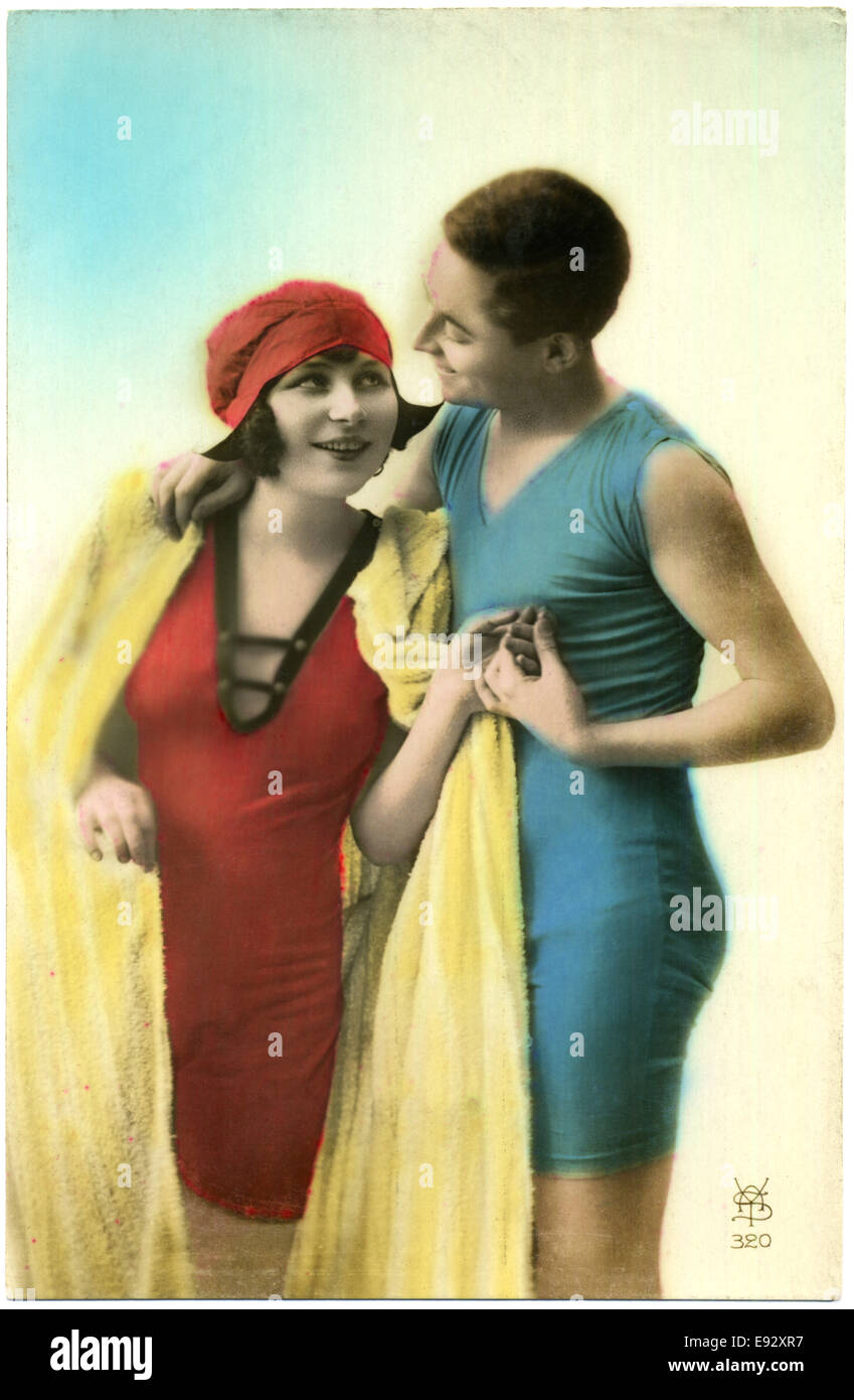Woman and Man in One-Piece Swimsuits, Hand-Colored French Postcard, circa early 1900's Stock Photo
