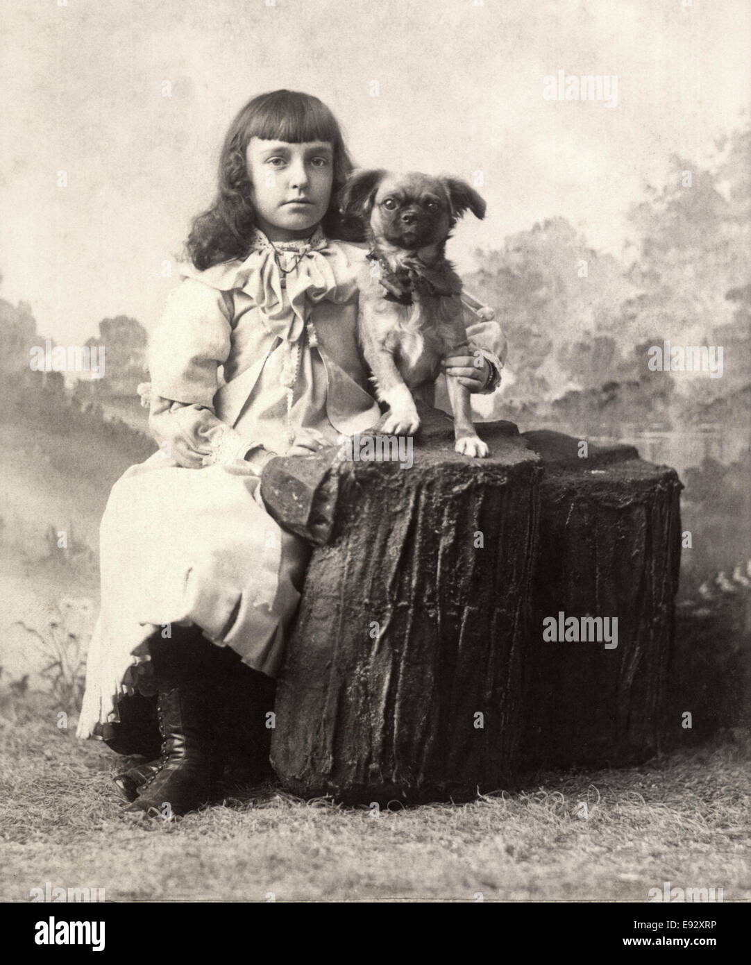 Girl with Puppy, Studio Portrait, Manchester, New Hampshire, USA, 1890 Stock Photo