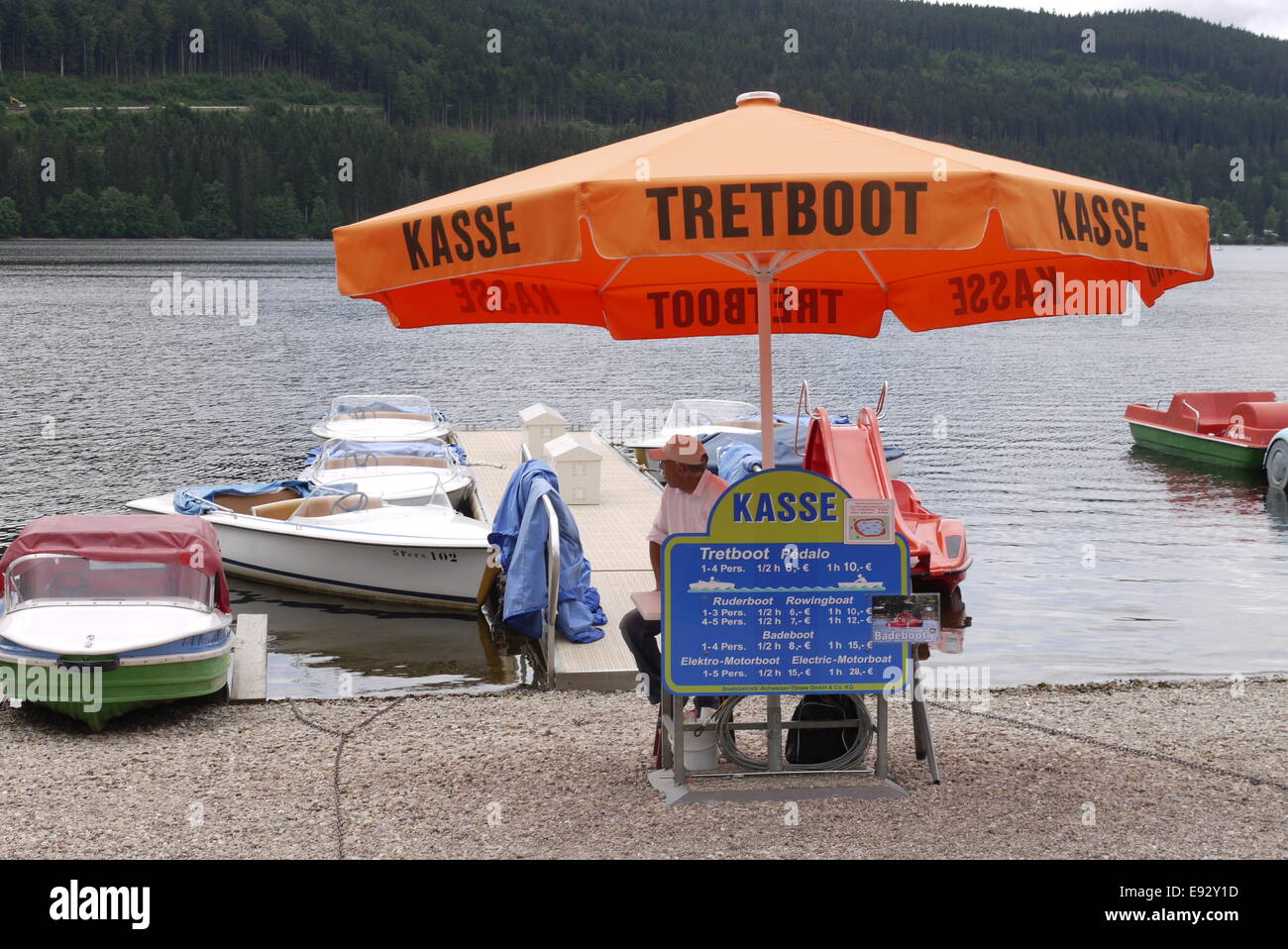 Boot- und Tretboot-Vermietung am Titisee, Boat renter lender at Lake Titi Stock Photo