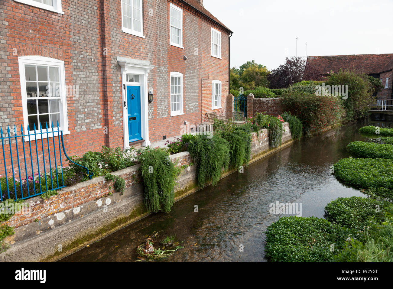 Brook House with stream running alongside, Bosham, West Sussex Stock Photo