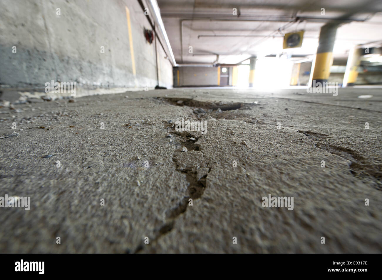 Damaged,worn,indoor parking garage Stock Photo Alamy