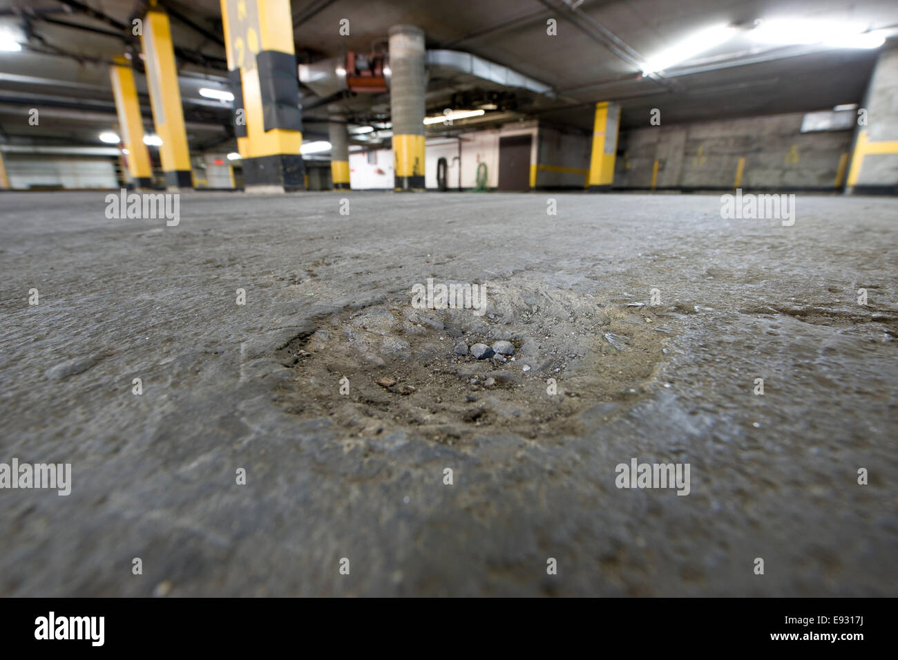 Damaged,worn,indoor parking garage Stock Photo Alamy