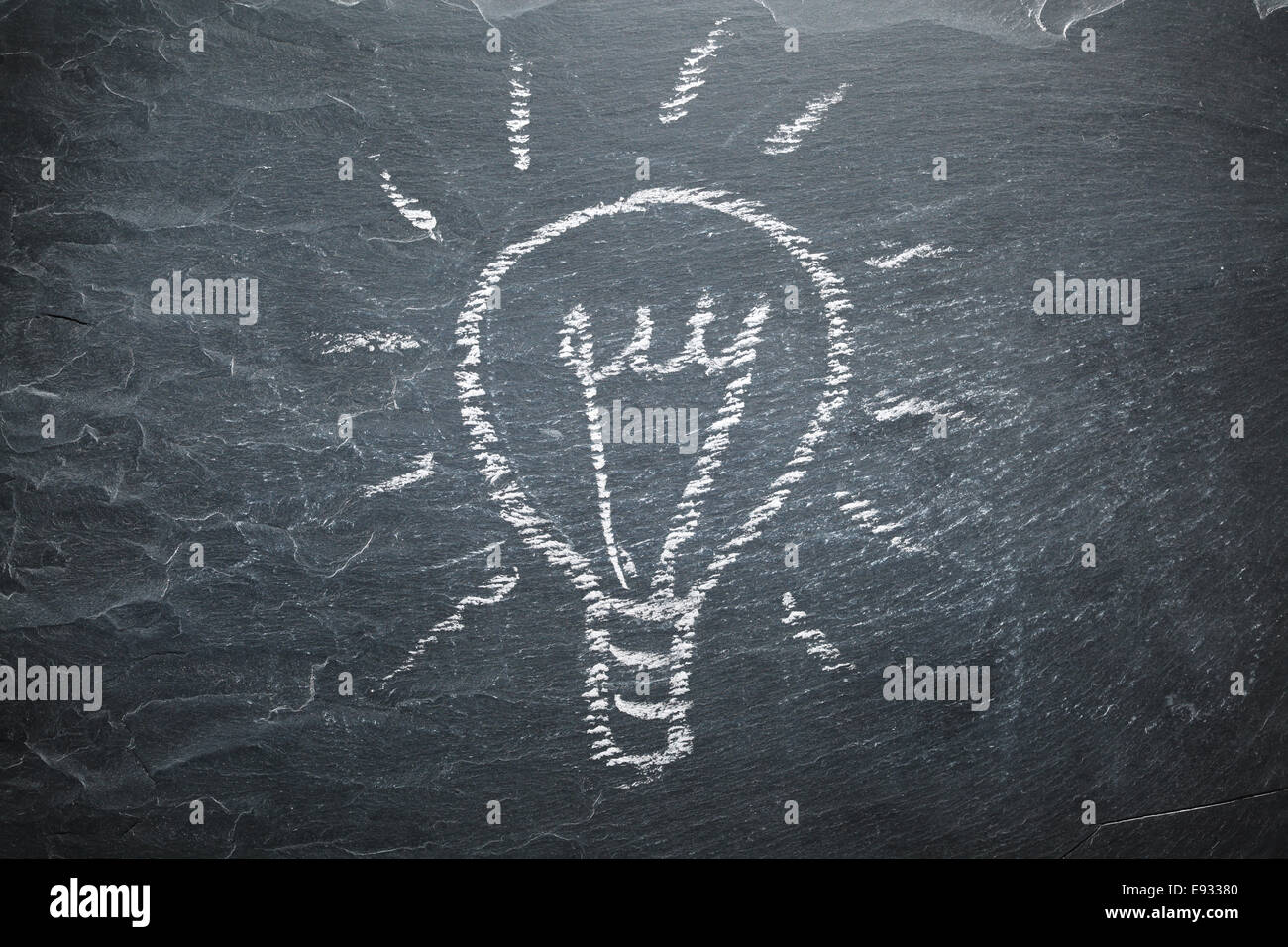 Light bulb on chalkboard Stock Photo