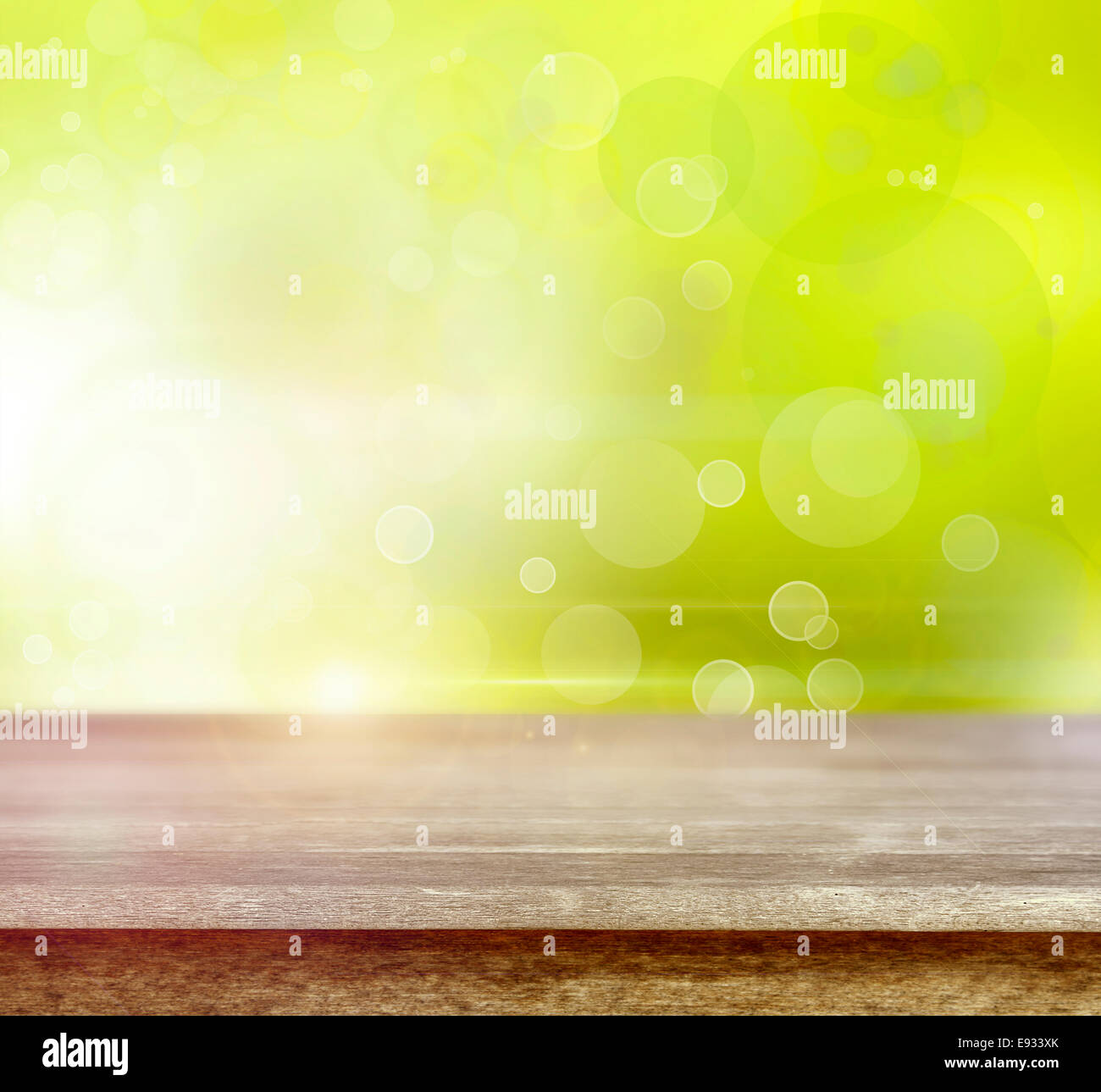 Empty table in front of abstract green background Stock Photo Alamy