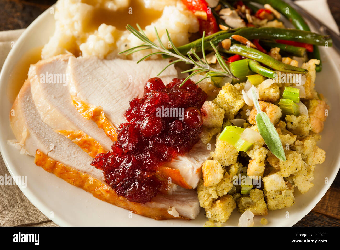 Homemade Thanksgiving Turkey on a Plate with Stuffing and Potatoes Stock Photo
