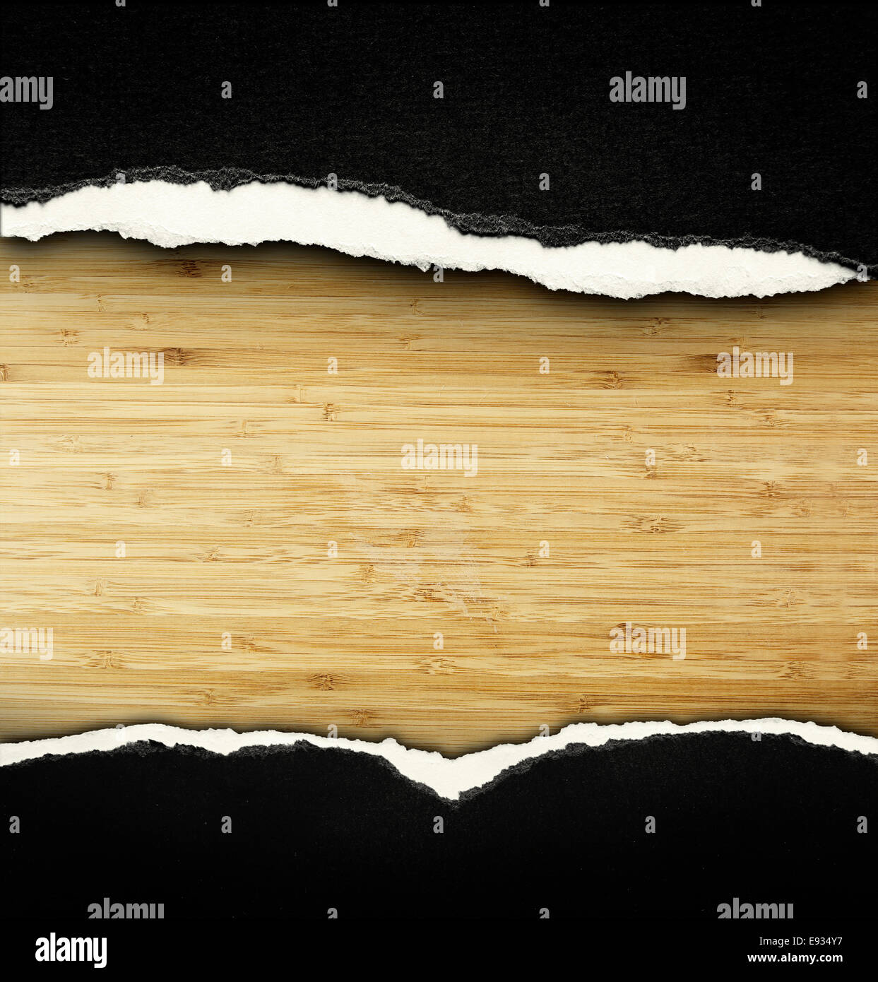Ripped paper on wood, space for copy Stock Photo - Alamy