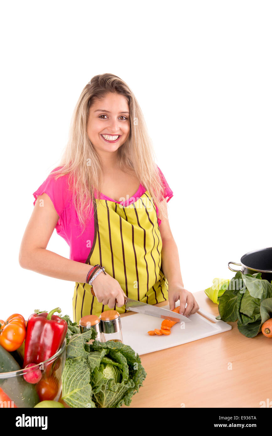 Beautiful woman cooking in the kitchen Stock Photo