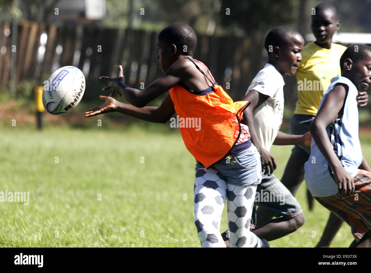 Underprivilaged Rugby Program Children play rugby africa hi-res stock photography and images - Alamy