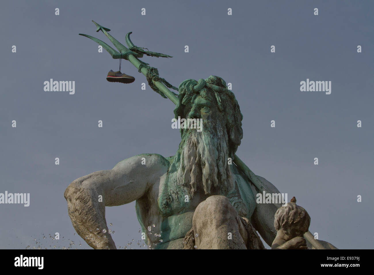 Green Bronze statue Neptune Trident Berlin trainer Stock Photo
