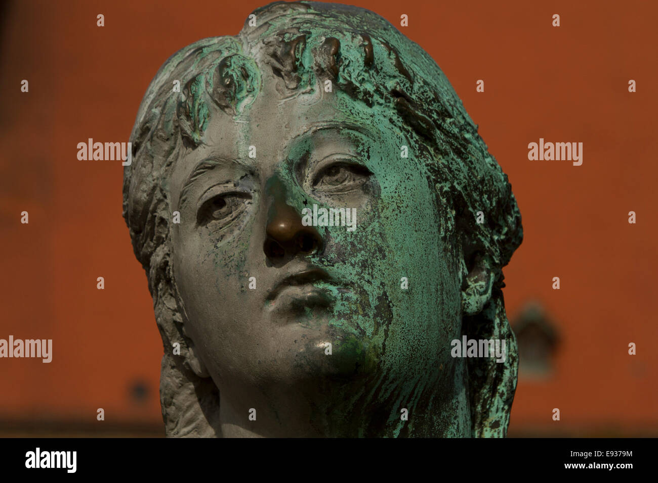 Green aged bronze statue mournful roman woman Stock Photo Alamy