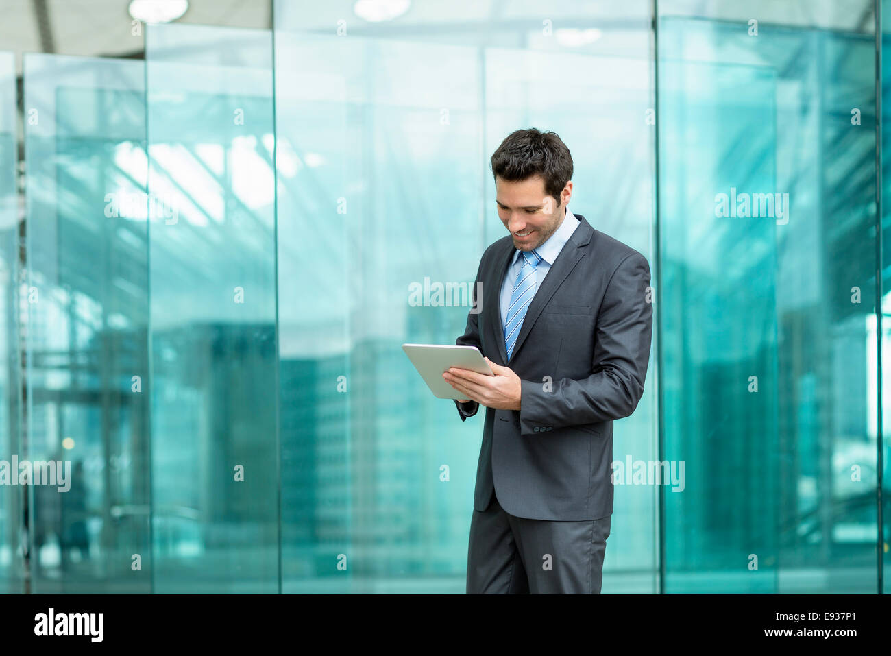 Businessman using a Digital Tablet Stock Photo