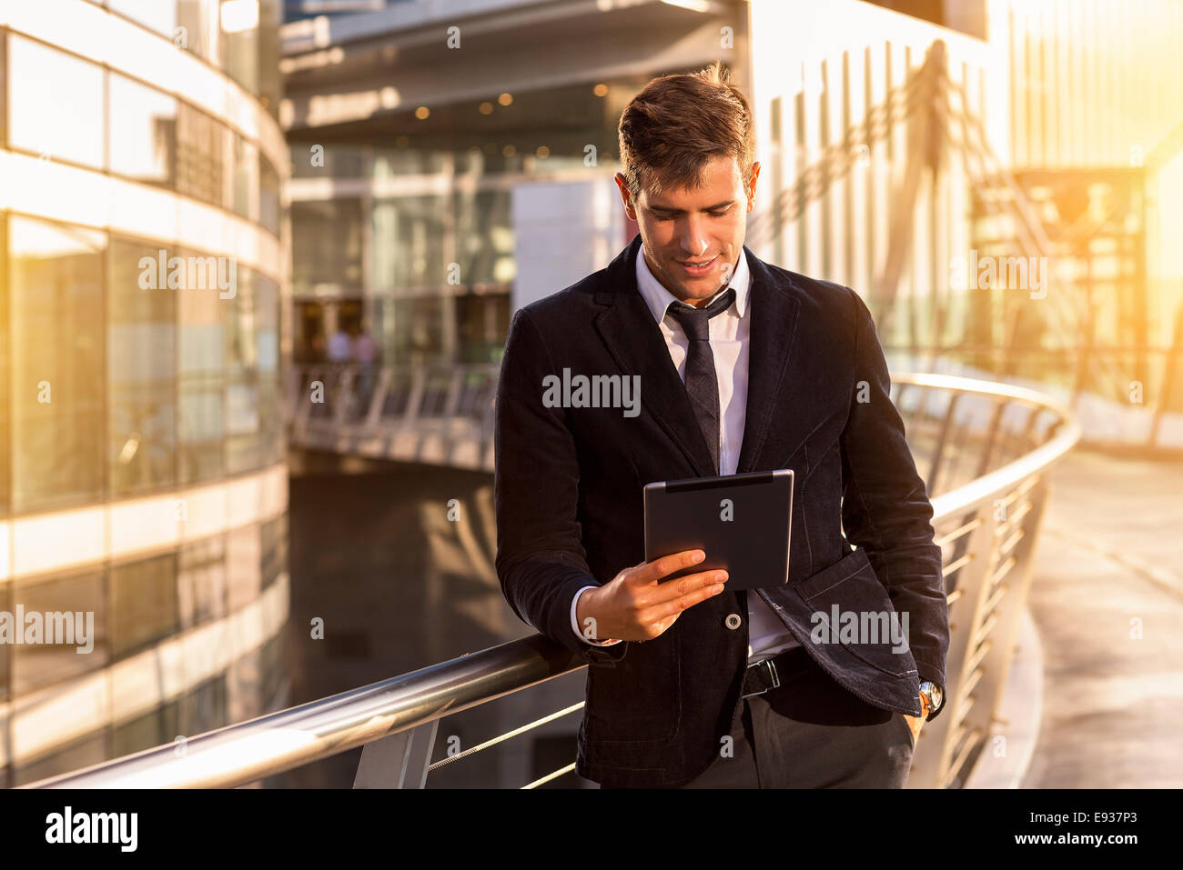 Portrait of businessman using a Digital Tablet Stock Photo - Alamy