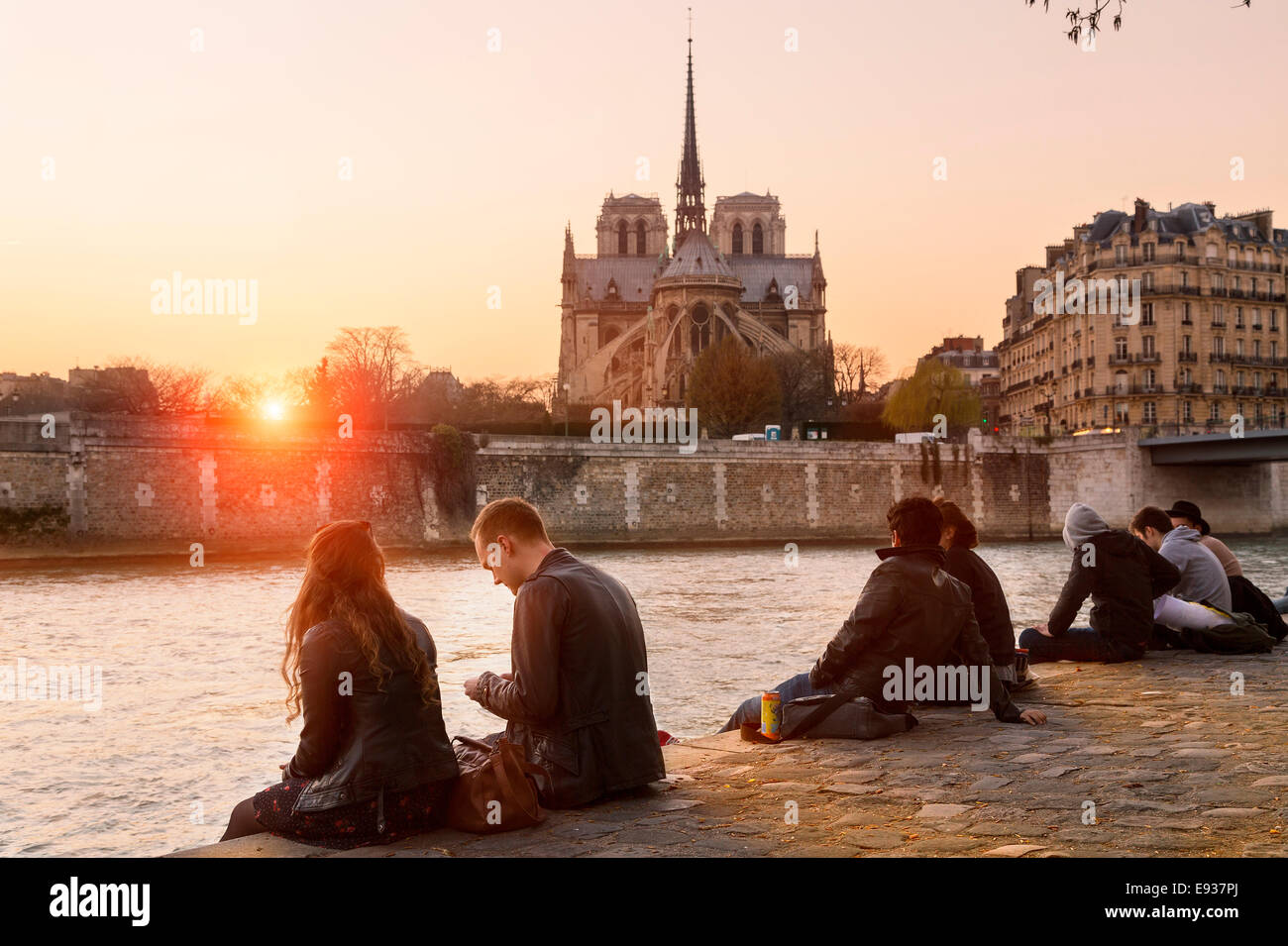 People relaxing along the seine river Stock Photo
