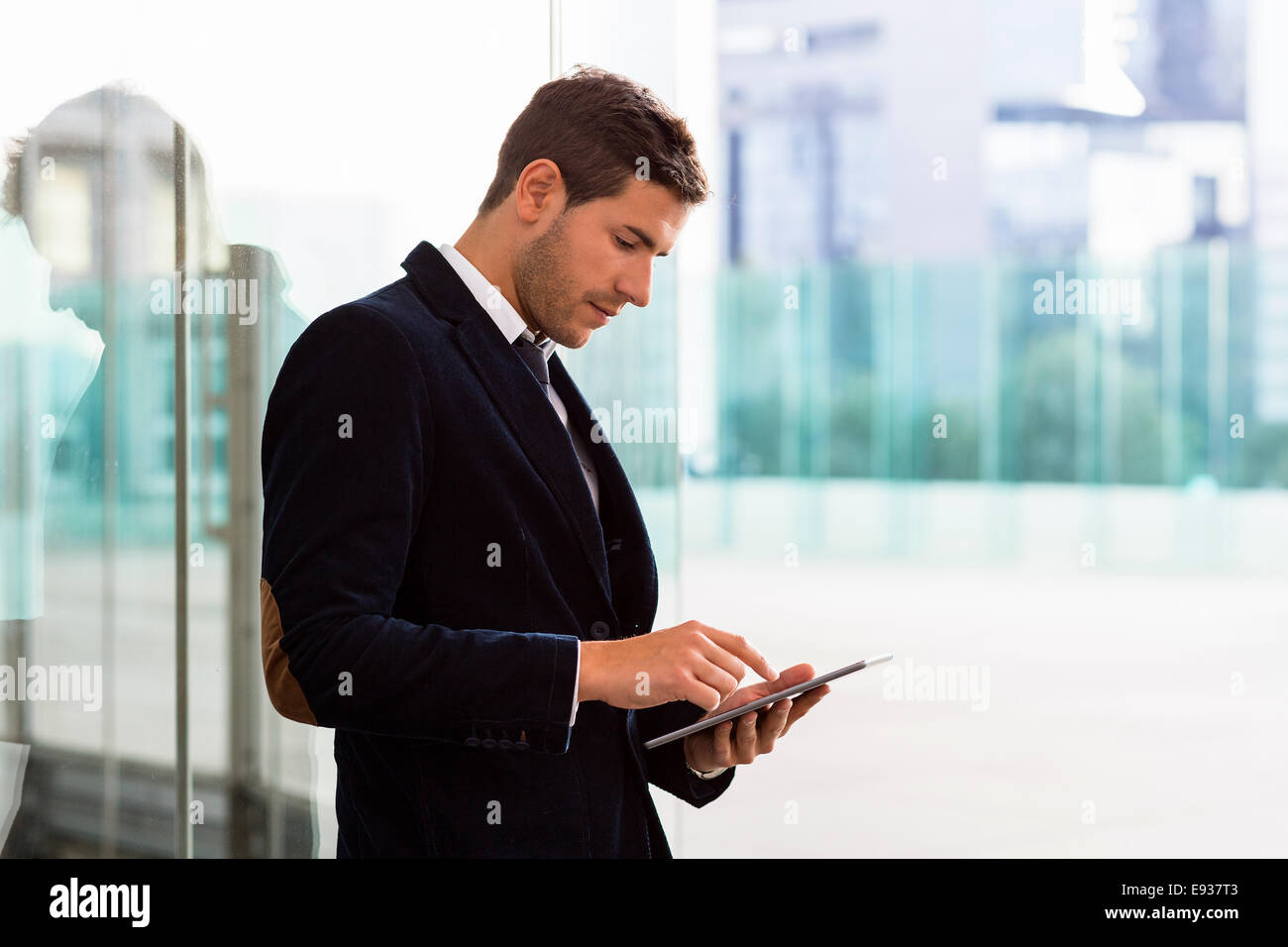 Businessman using Digital Tablet Stock Photo