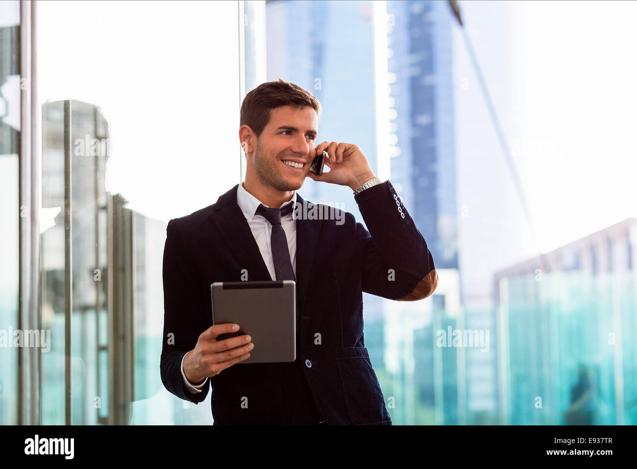 Businessman using Mobile phone Stock Photo