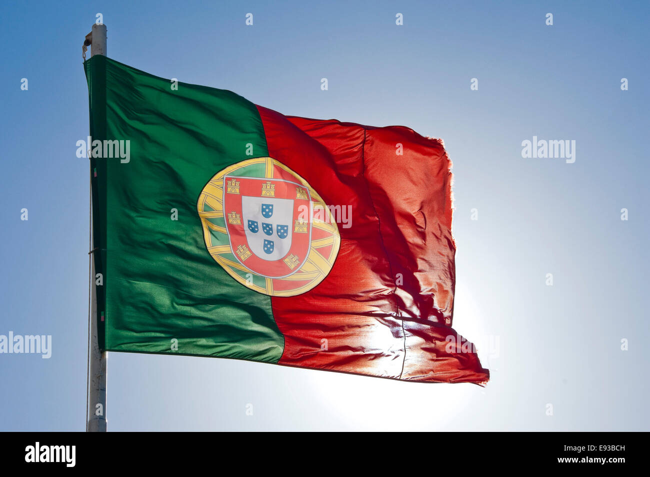 Horizontal close up view of the Portugese national flag in Lisbon. Stock Photo