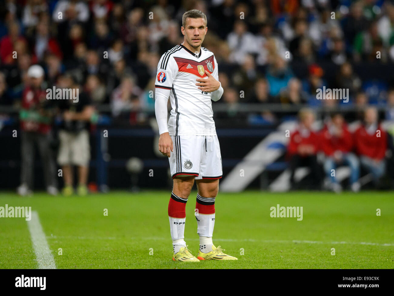 Geselnkrichen, Germany. 14th Oct, 2014. Germany's Lukas Podolski reacts during the UEFA EURO 2016 qualifying soccer match between Germany and Ireland in Geselnkrichen, Germany, 14 October 2014. Photo: Thomas Eisenhuth/dpa/Alamy Live News Stock Photo