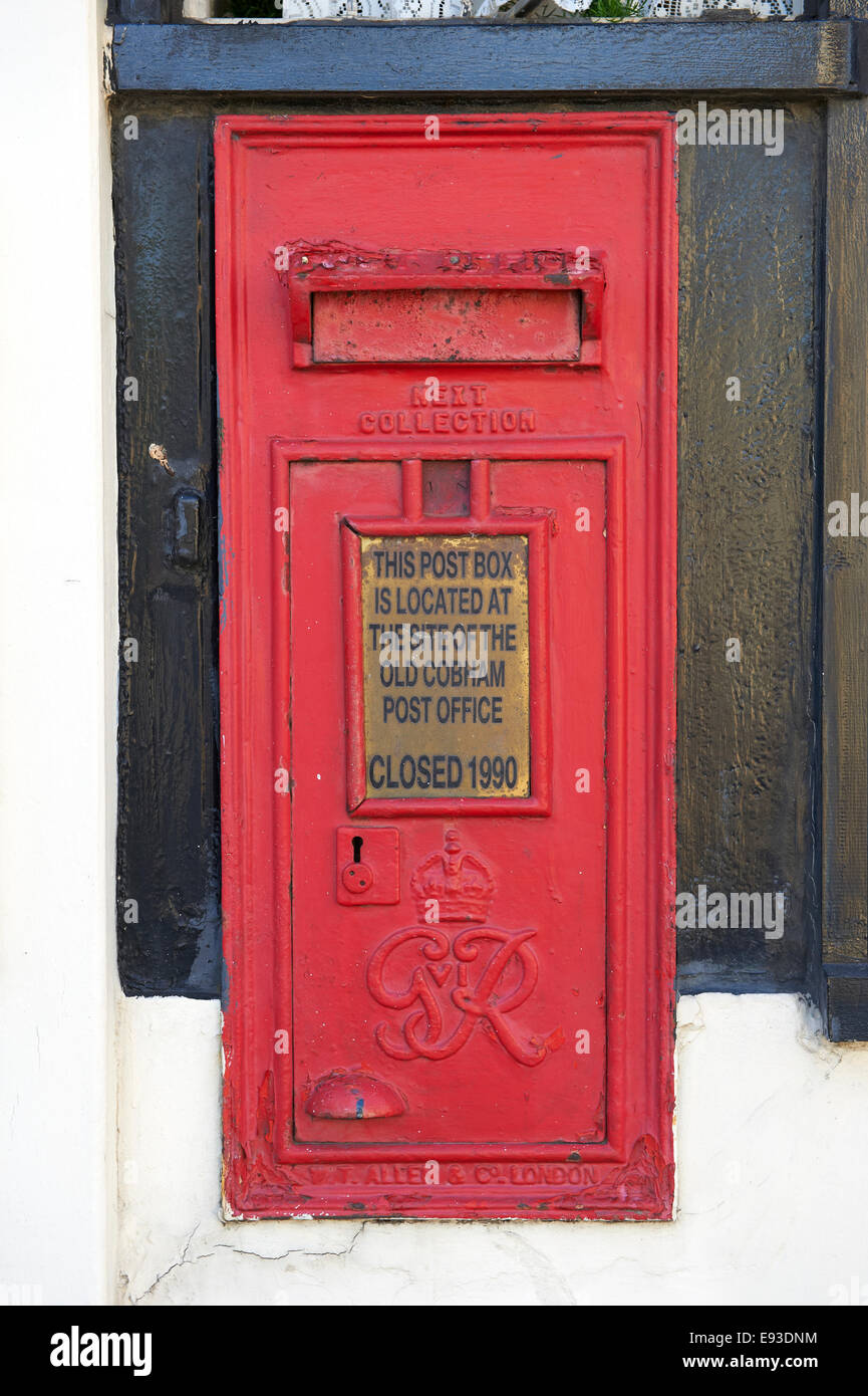 Closed Royal Mail post box built into wall Stock Photo